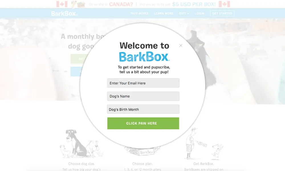 A lightbox popup where the entire background of the website is transparent, with the popup on top. The popup is from BarkBox, asking the visitor to sign up for the website.