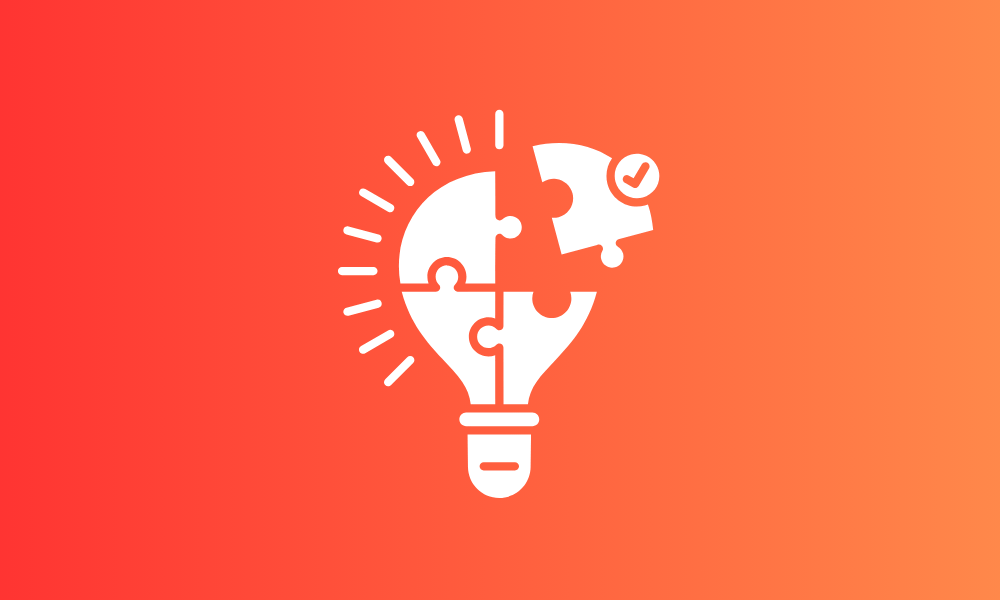 An illustration of a white lightbulb icon constructed from four jigsaw puzzle pieces. One of the pieces hovers closely, almost fitting into place. The illustration is set against a vibrant yellow and red gradient background